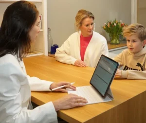 Mesoloog in gesprek met een patiënt